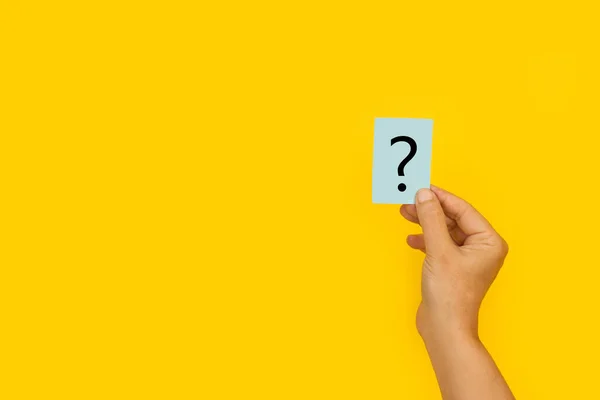 depositphotos 390523748 stock photo woman hand holding paper question